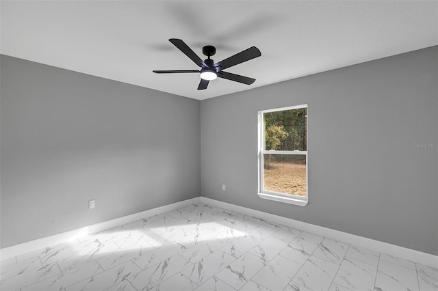 spare room featuring ceiling fan