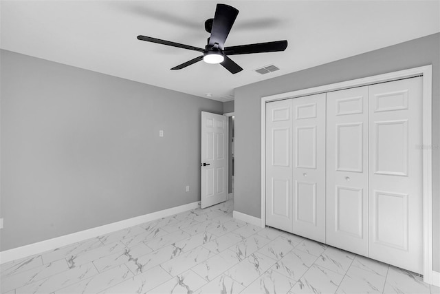 unfurnished bedroom with a closet and ceiling fan