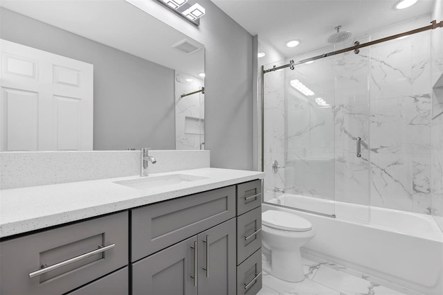 full bathroom with vanity, toilet, and combined bath / shower with glass door