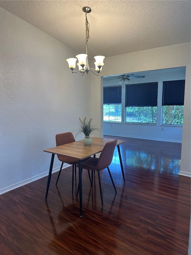8968 SW 116th Place Rd, Ocala, FL 34481 - dining space featuring wood finished floors, a chandelier, a textured ceiling, baseboards, and a textured wall