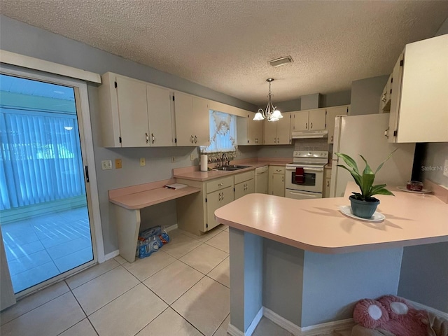 kitchen featuring kitchen peninsula, white appliances, sink, light tile patterned floors, and decorative light fixtures