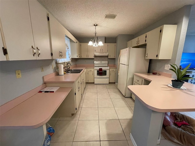 kitchen with kitchen peninsula, a kitchen breakfast bar, white appliances, sink, and pendant lighting