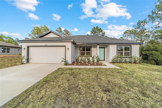 ranch-style house featuring a garage and a front yard