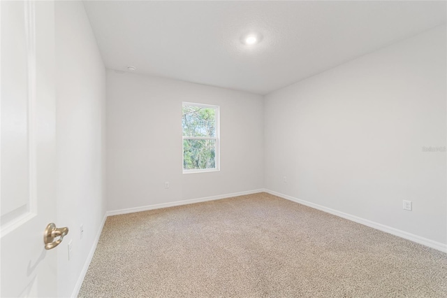 spare room with carpet flooring