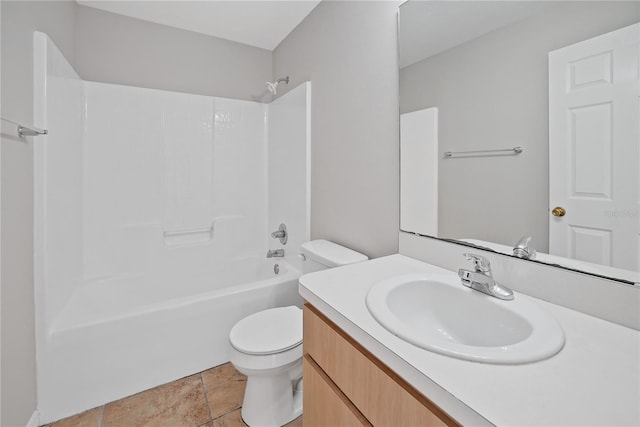 full bathroom featuring toilet, bathtub / shower combination, vanity, and tile patterned floors