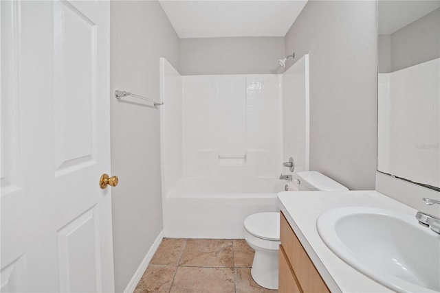 full bathroom featuring tile patterned floors, washtub / shower combination, vanity, and toilet