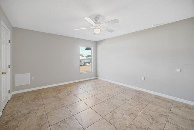 unfurnished room with ceiling fan