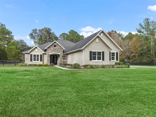 view of front of home featuring a front lawn