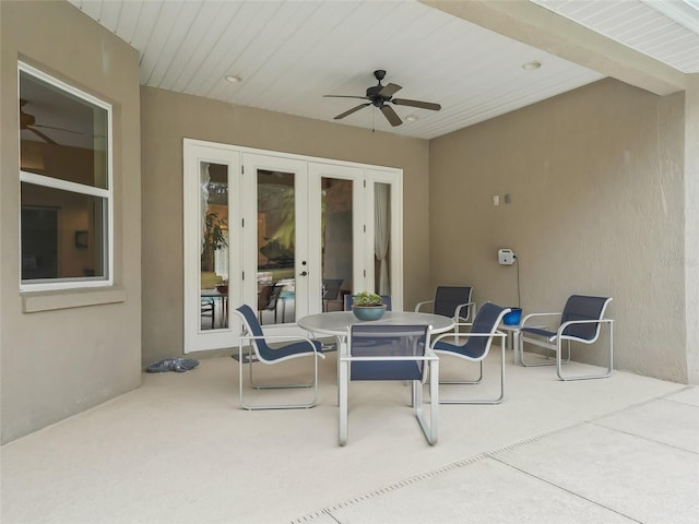 view of patio featuring french doors and ceiling fan