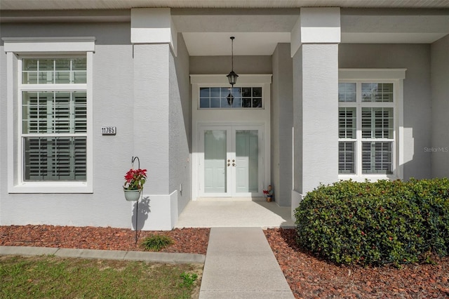 doorway to property featuring french doors