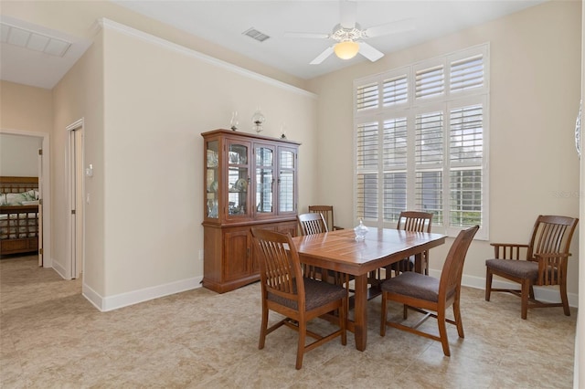 dining room with ceiling fan