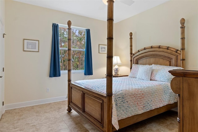 tiled bedroom with ceiling fan