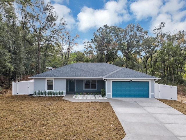 ranch-style home featuring a garage