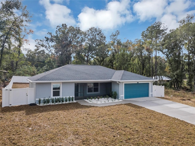 single story home featuring a garage