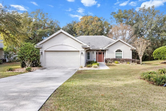 single story home with a garage and a front lawn