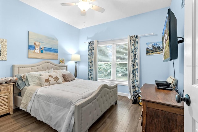 bedroom featuring dark hardwood / wood-style floors and ceiling fan