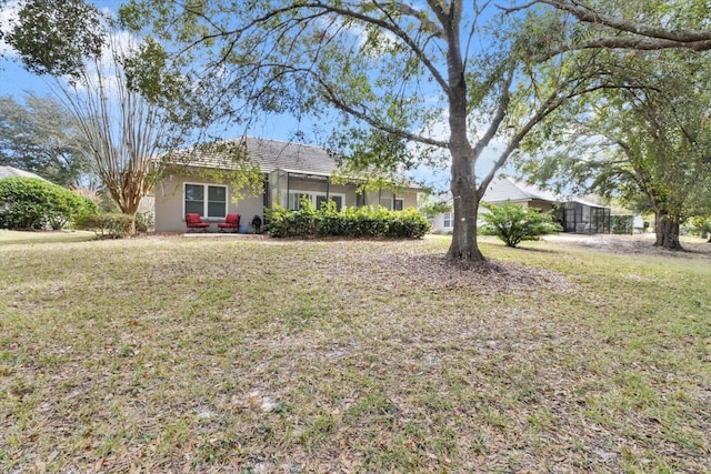 exterior space with a front lawn