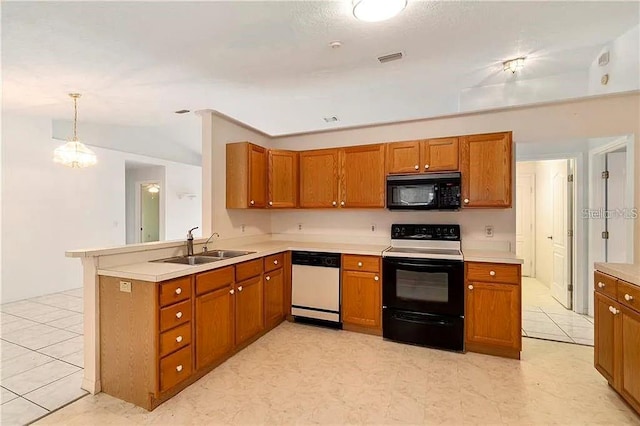 kitchen with kitchen peninsula, white appliances, hanging light fixtures, and sink