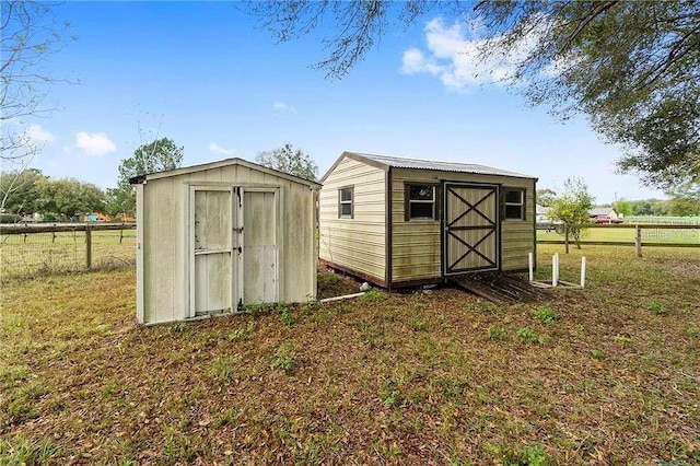 view of outbuilding with a lawn