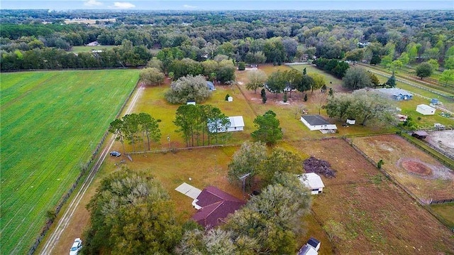 birds eye view of property with a rural view