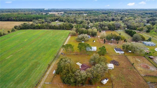 birds eye view of property featuring a rural view