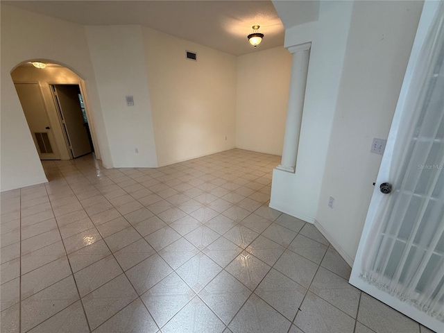 empty room with ornate columns