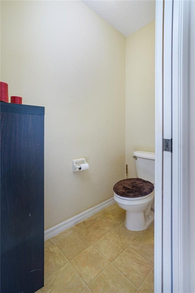 bathroom featuring toilet