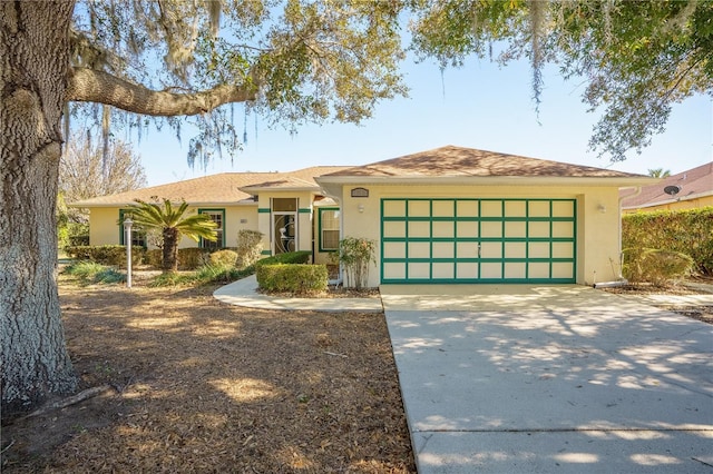 single story home with a garage