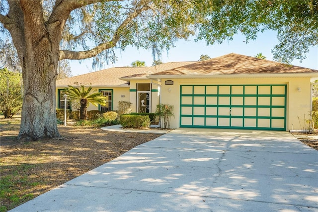 single story home with a garage