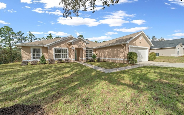 single story home with a garage and a front lawn