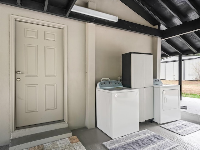 laundry area with separate washer and dryer