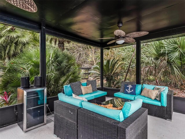 view of patio / terrace featuring an outdoor living space and ceiling fan