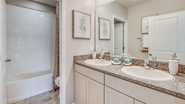 bathroom with shower / tub combo, a sink, toilet, and double vanity