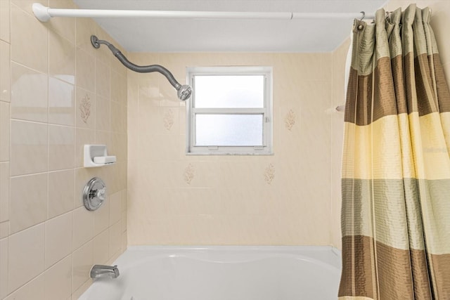 bathroom featuring shower / bathtub combination with curtain