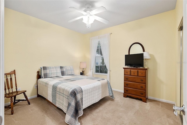 bedroom with ceiling fan and light colored carpet