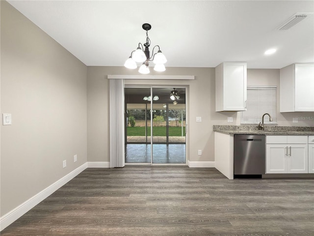 kitchen featuring dishwasher, an inviting chandelier, hanging light fixtures, dark hardwood / wood-style floors, and white cabinetry