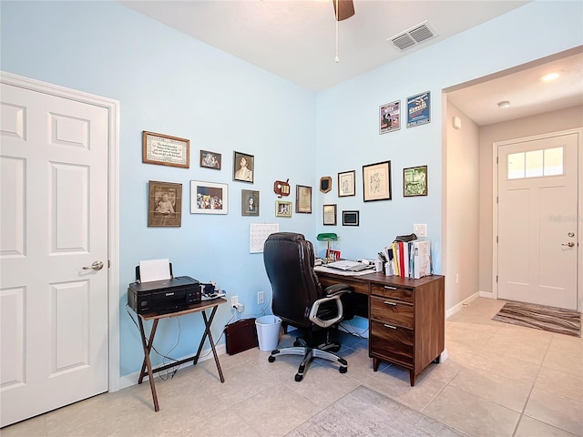 home office featuring ceiling fan and light tile patterned flooring