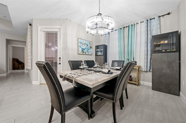 dining room featuring an inviting chandelier