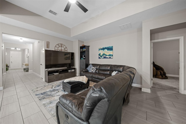 living room featuring ceiling fan