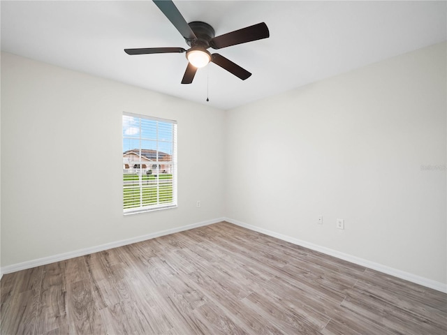 unfurnished room with ceiling fan and light hardwood / wood-style floors