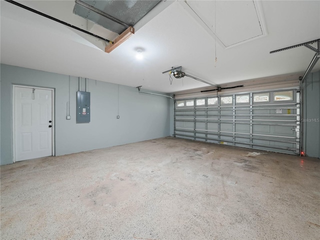 garage with electric panel and a garage door opener