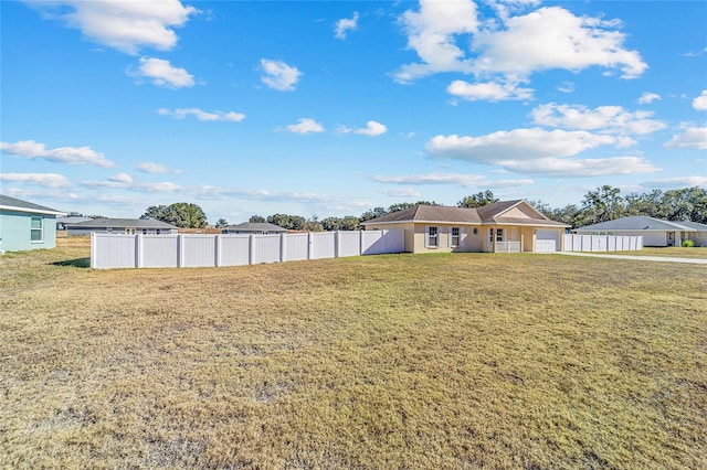 view of yard featuring a garage