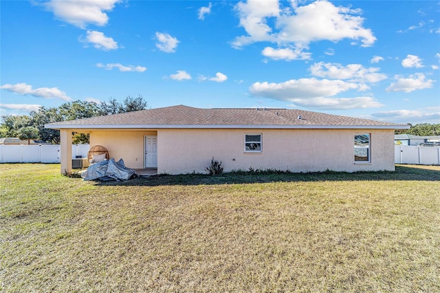 view of side of home featuring a yard