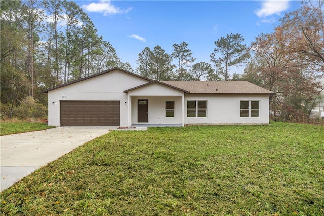 single story home with a front yard and a garage