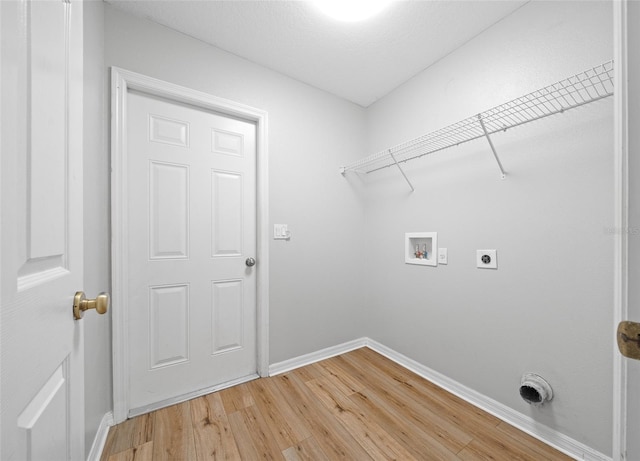 laundry area featuring hookup for a washing machine, wood-type flooring, and hookup for an electric dryer