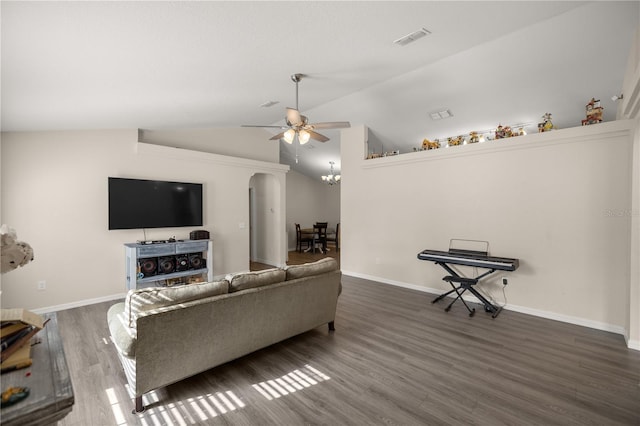 living room featuring vaulted ceiling, ceiling fan with notable chandelier, and dark hardwood / wood-style floors