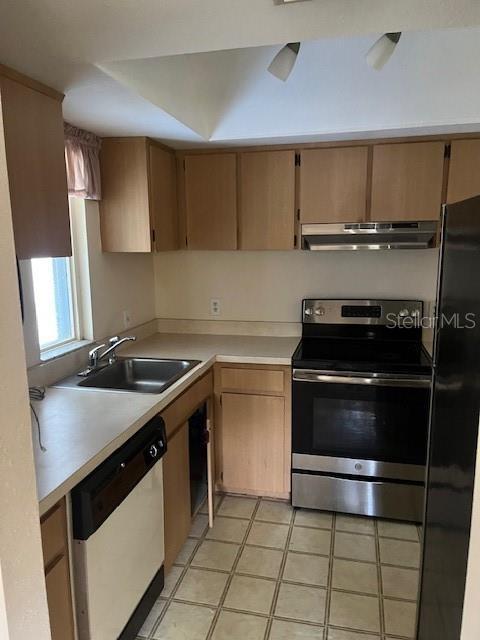 kitchen with sink and appliances with stainless steel finishes