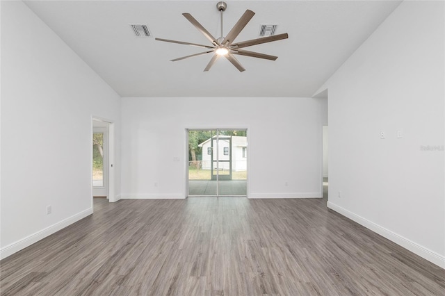 empty room featuring hardwood / wood-style floors and ceiling fan