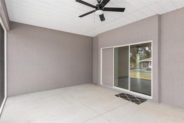 view of patio with ceiling fan