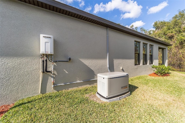 view of side of home featuring a lawn